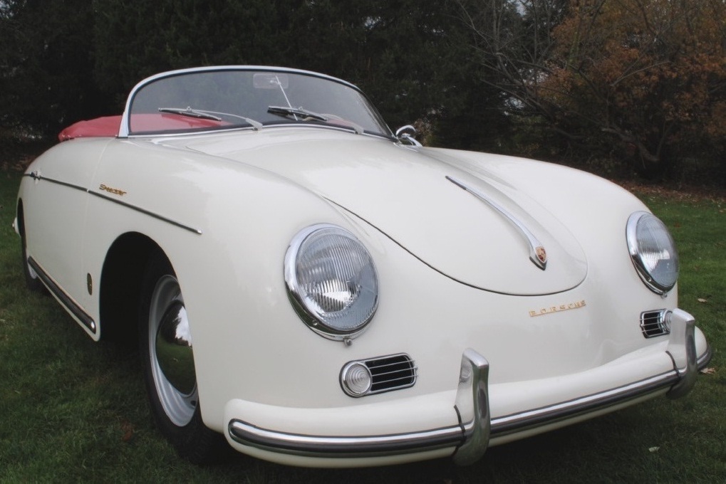 Elegant and rare 1957 Porsche 356A Speedster, white over red, rebuilt with precision craftsmanship and complete mechanical update..