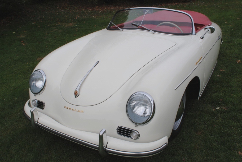 Vintage 1957 Porsche 356A Speedster with refined white exterior, fully restored front end, and strong mechanical precision..