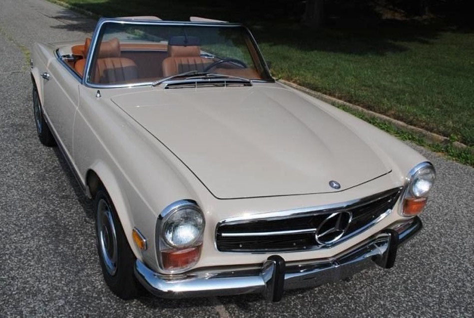 Highly refined 1971 Mercedes-Benz 280SL Pagoda with soft top and restored woodwork.