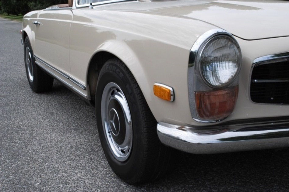 Factory-spec 1971 Mercedes 280SL convertible in Beige with perfectly preserved trim.