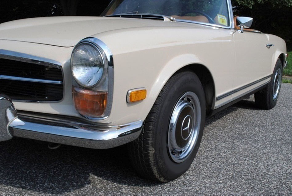 Beige 280SL with original Cognac leather, excellent panel fit, and factory equipment kit.