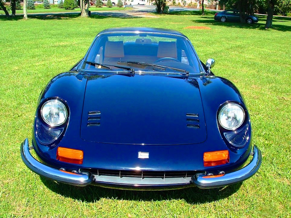 A show-level 1974 Ferrari 246 GTS Dino with expertly recovered dash, tan leather cockpit, and a fully detailed chassis worthy of any elite garage.